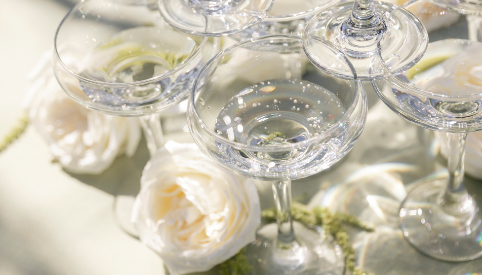 a stack of champagne glasses