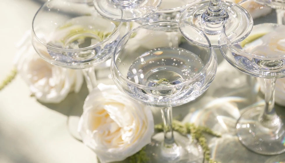 a stack of champagne glasses