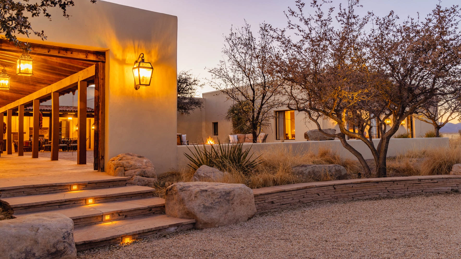 a house with a light on the wall