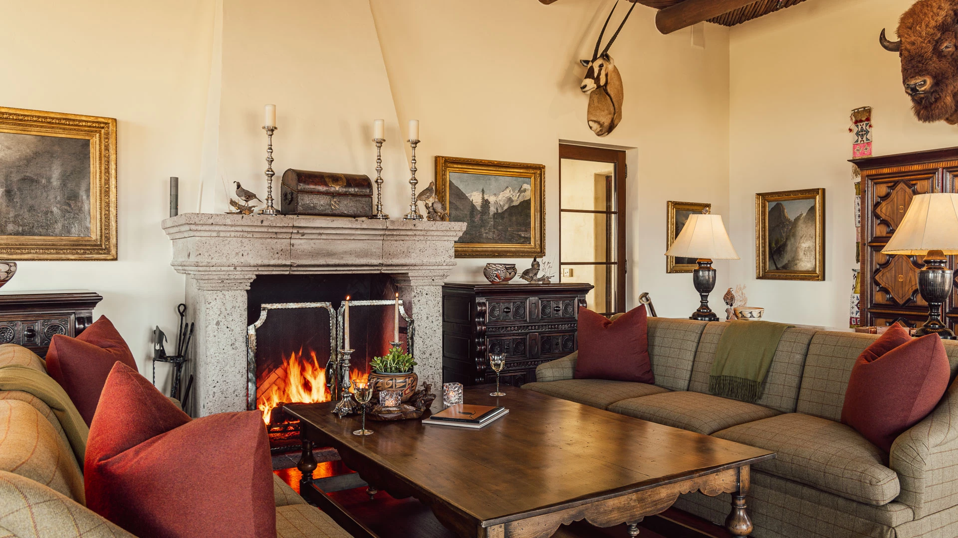 a living room with a fireplace and a couch