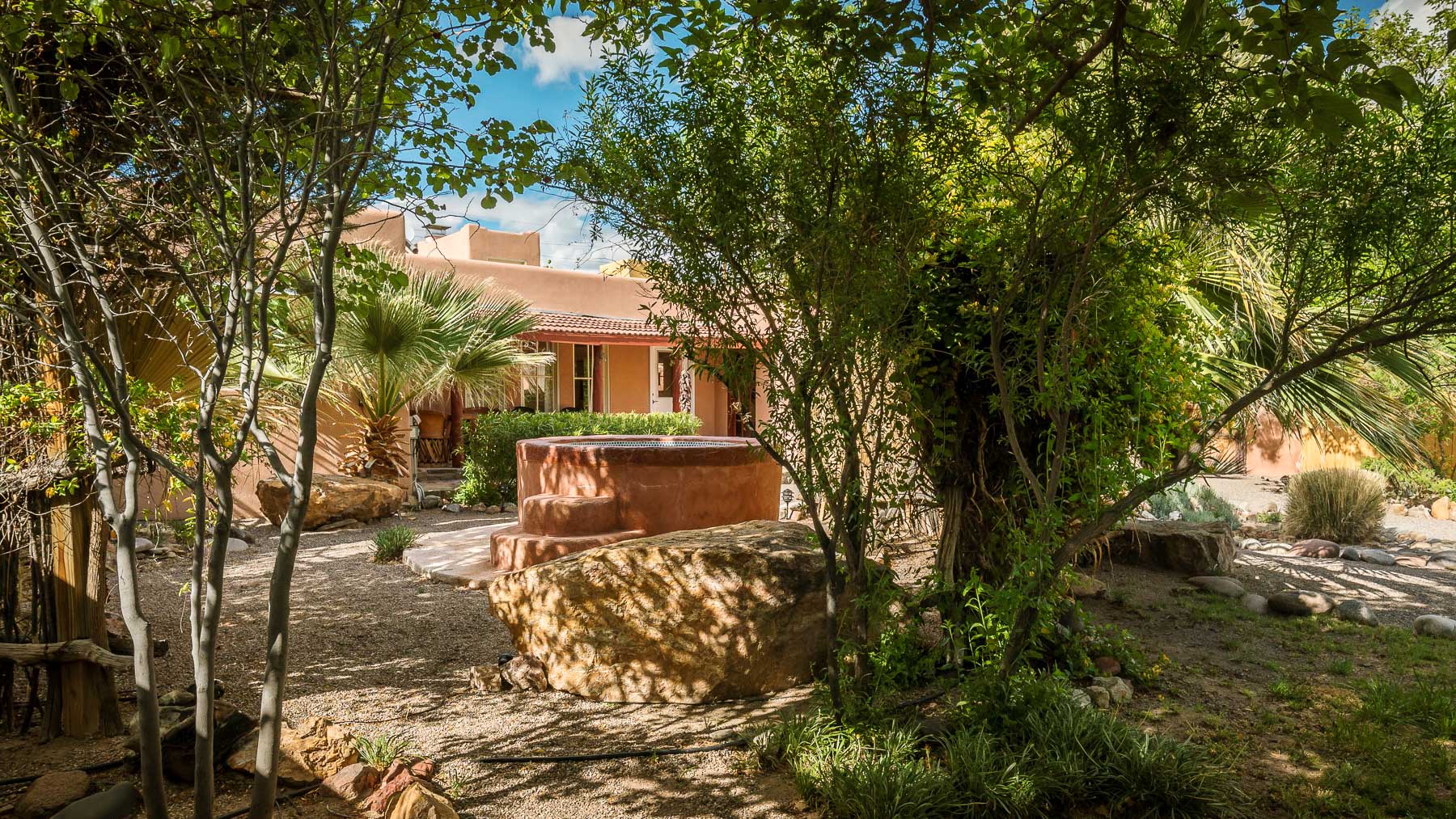 a stone fountain in a courtyard