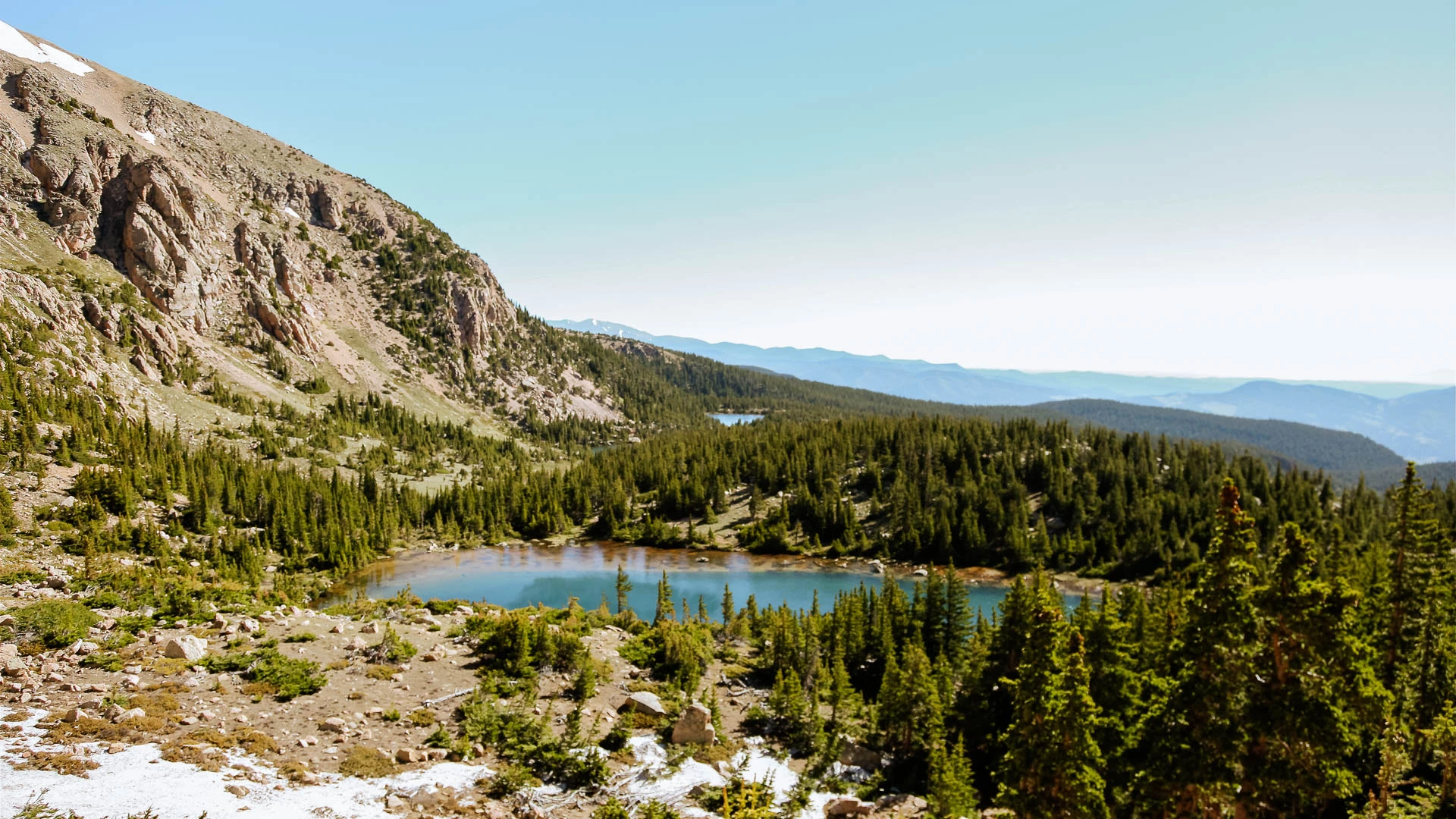 a lake surrounded by trees