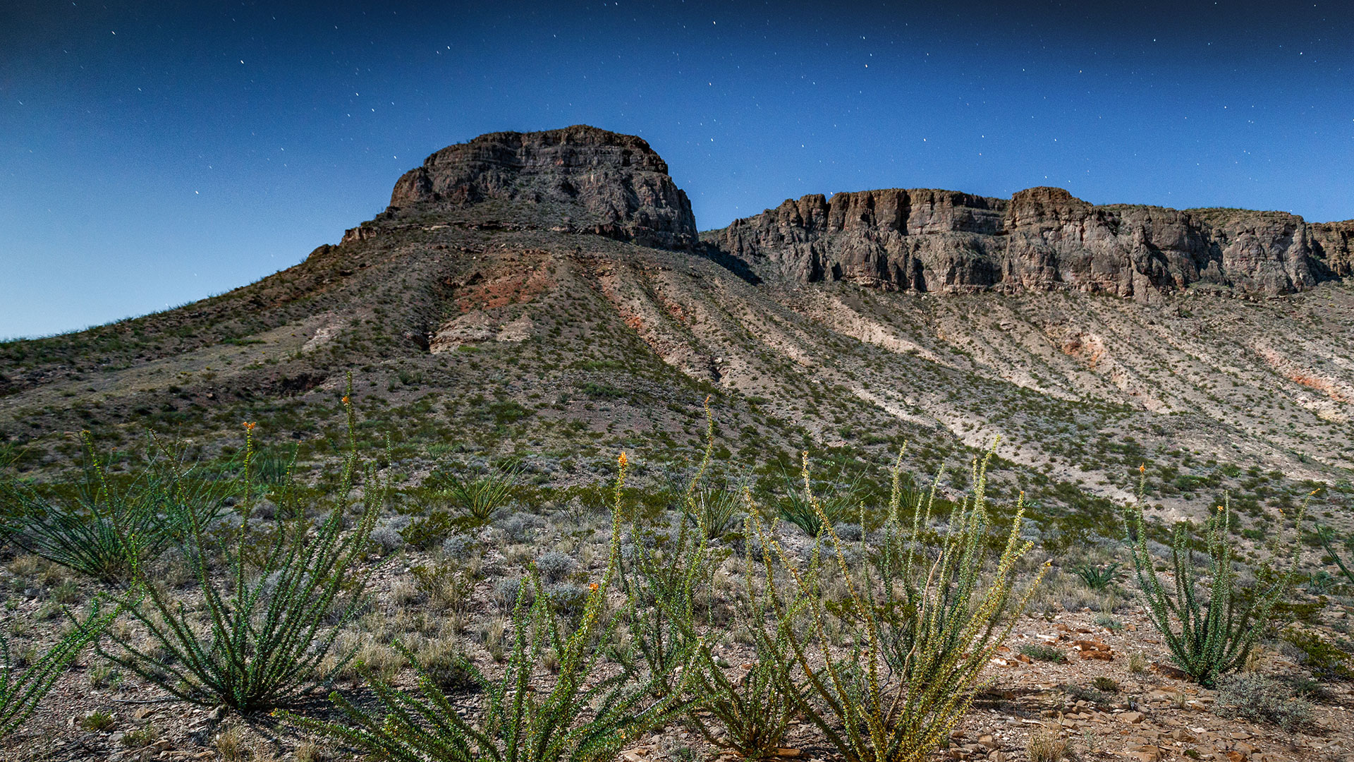 a mountain with a rocky hill