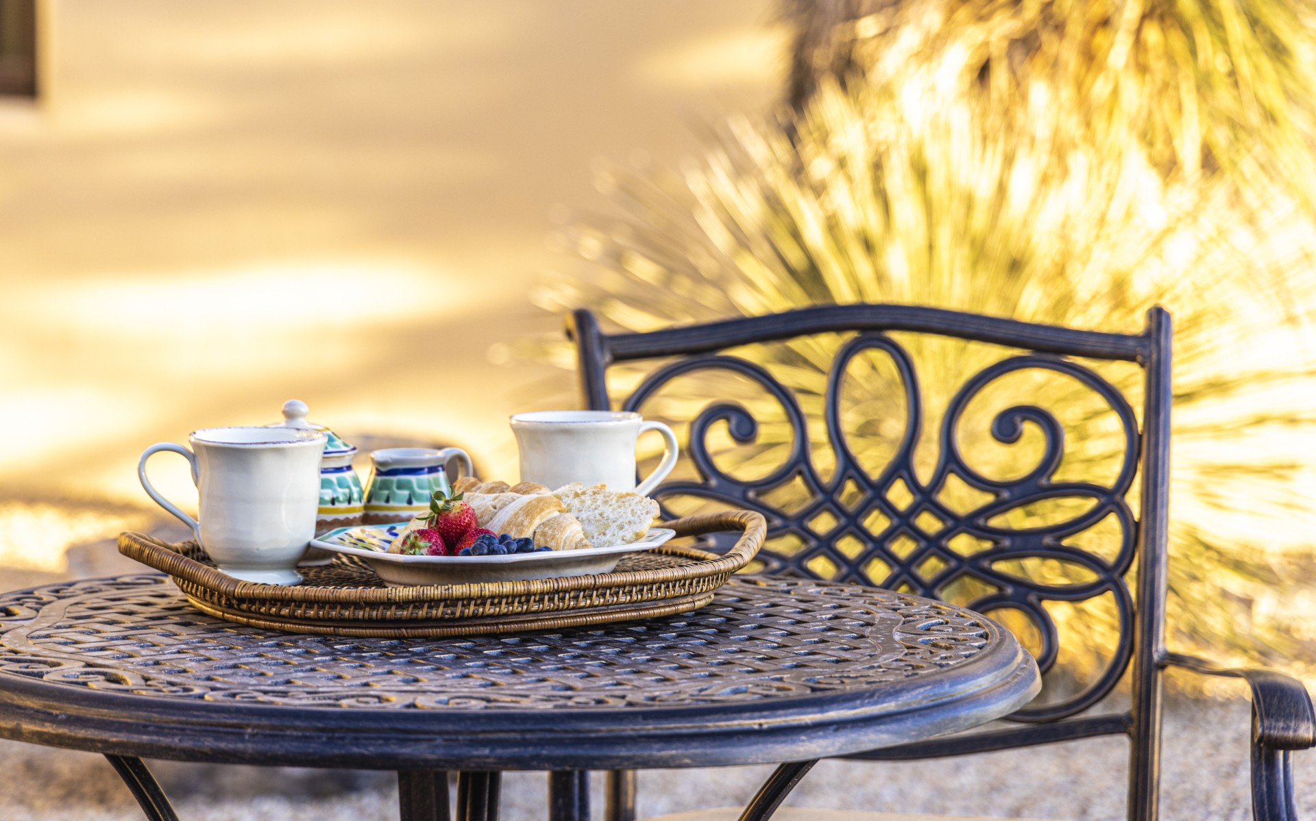 a plate of fruit and cookies on a table