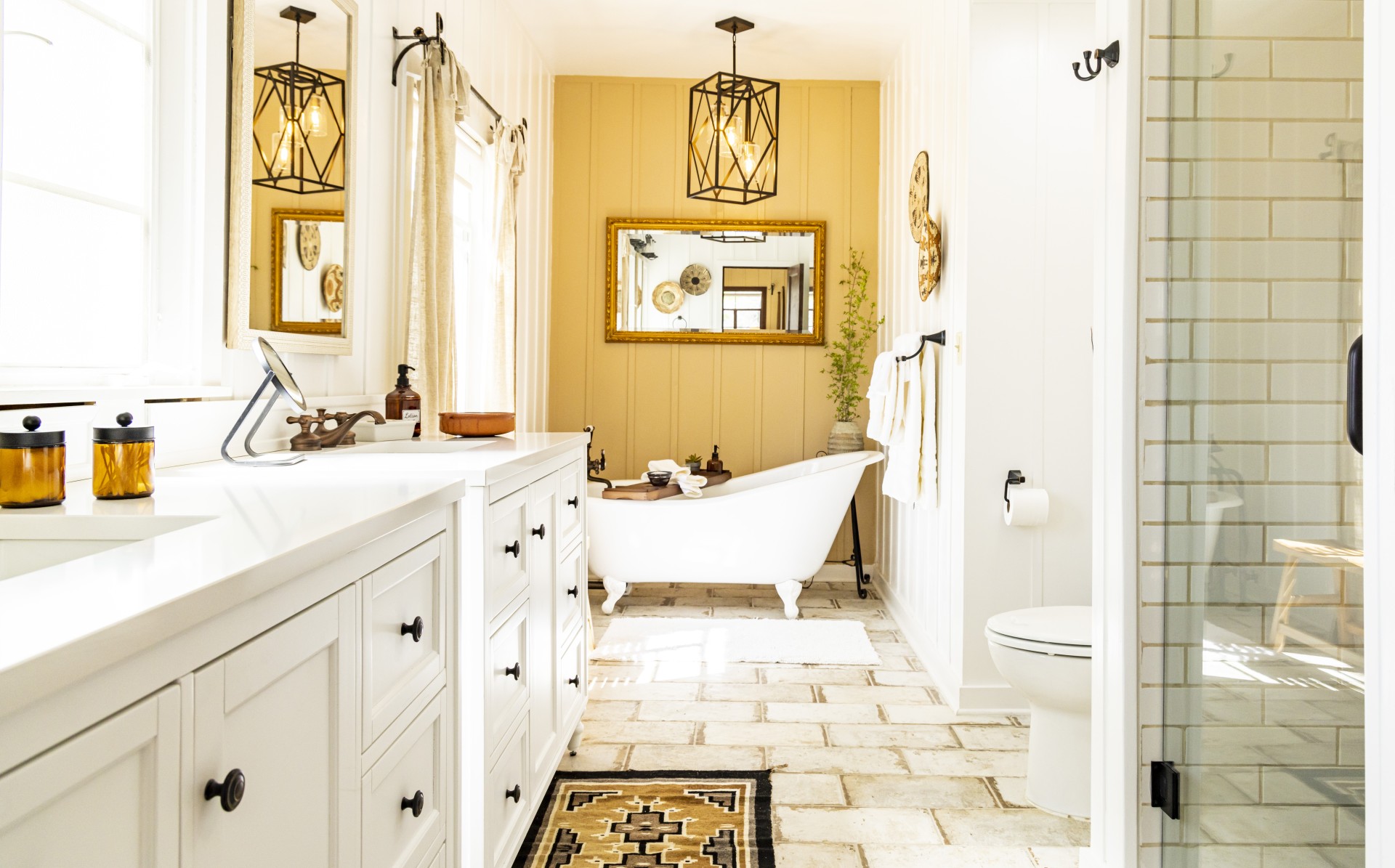 a bathroom with a tub and sink