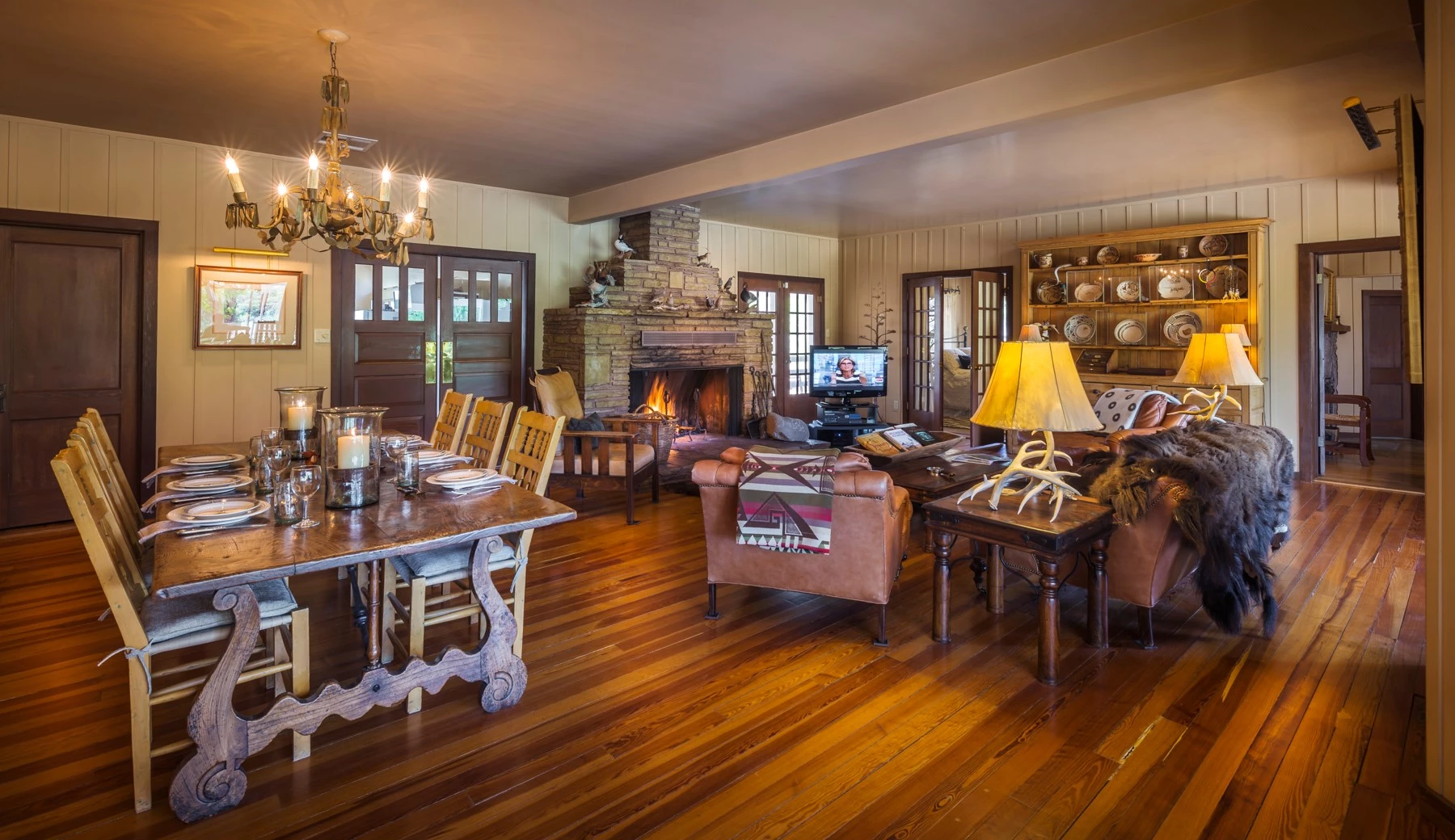 a living room with a fireplace and a couch