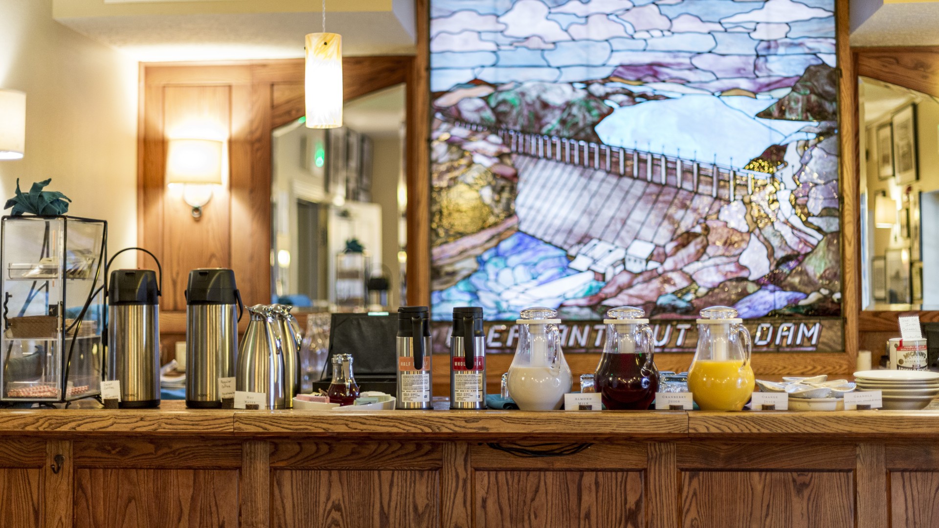 a counter with different drinks on it