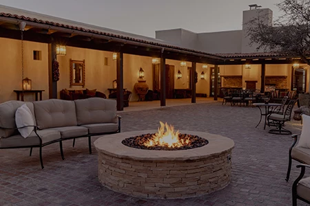 a fire pit in a courtyard