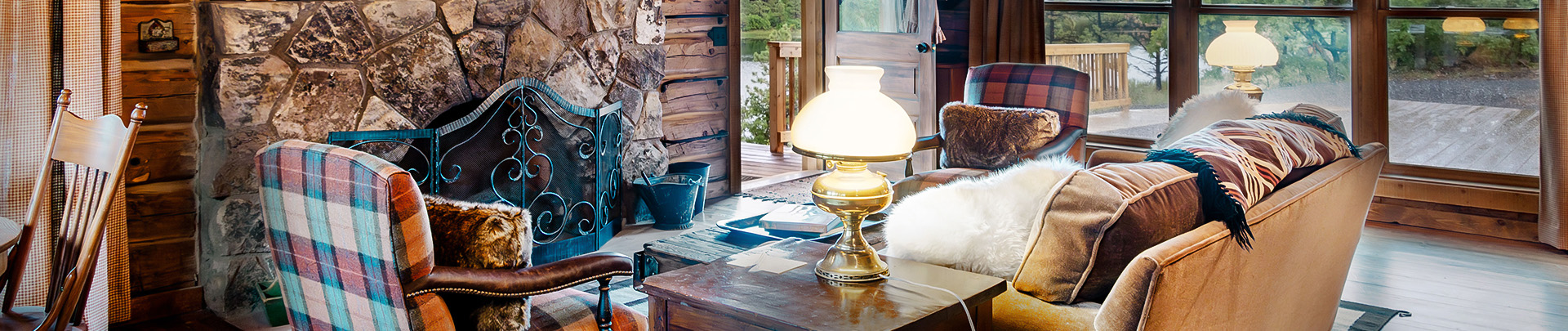a bear sitting in a chair in a living room