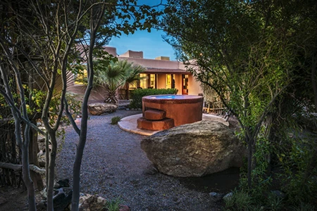 a stone fountain in a courtyard