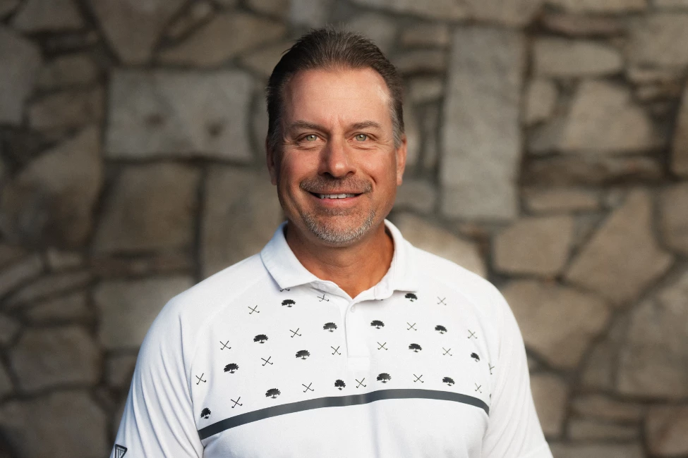 a man smiling at camera