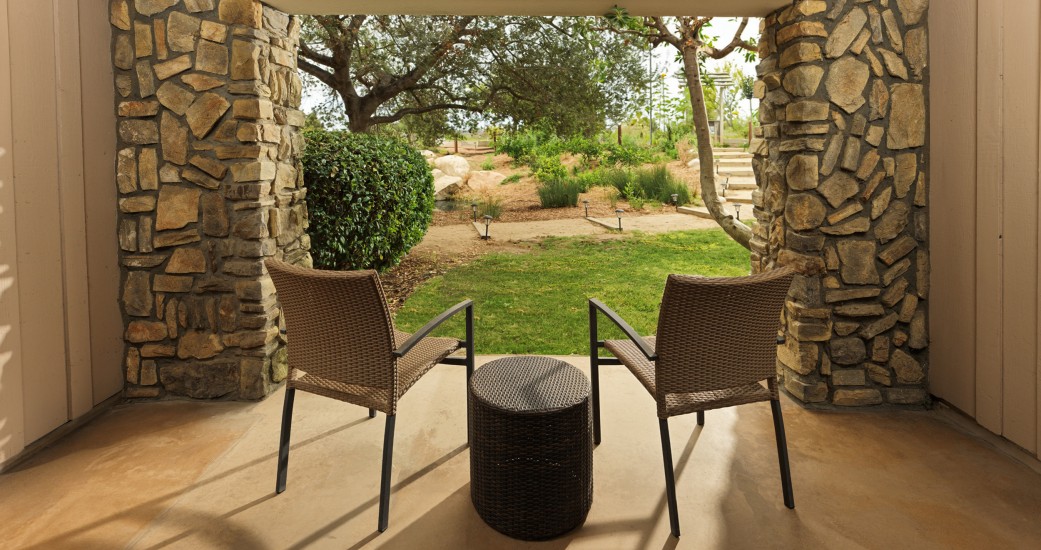 two chairs and a table outside