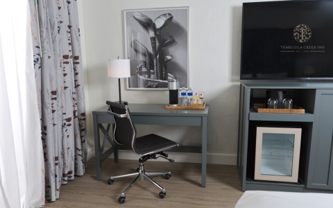 a chair and a desk in a room