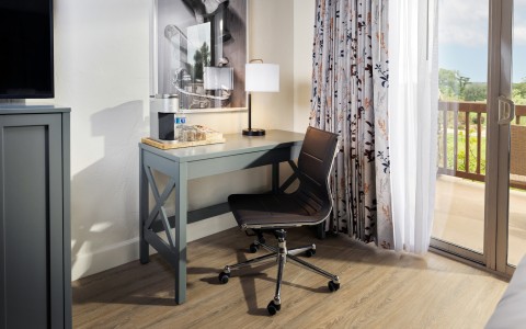 a desk and chair in a room