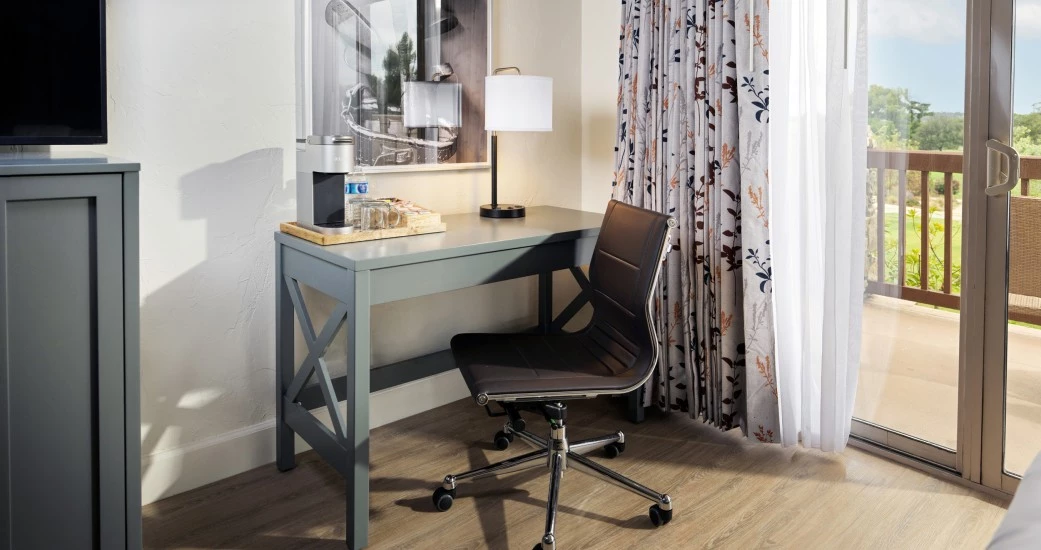 a desk and chair in a room