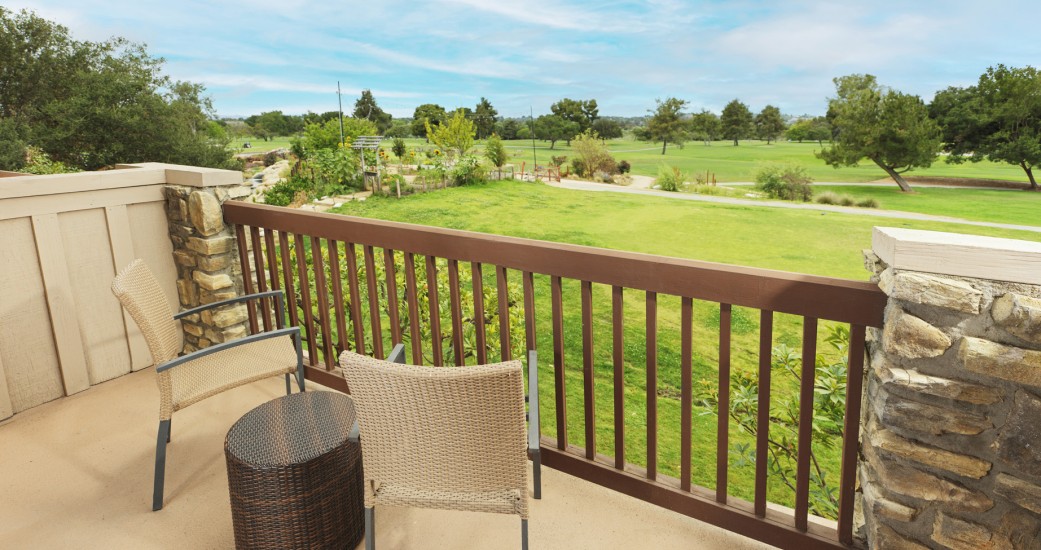 a chair and table on a deck