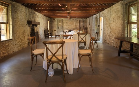 a room with tables and chairs