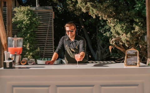 a man standing at a bar