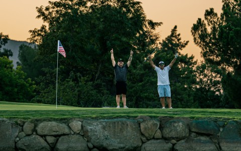 two men on a golf course