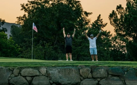 two men on a golf course