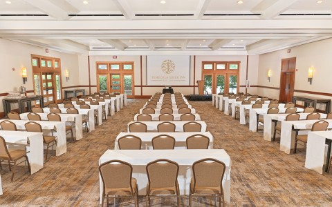 a room with tables and chairs