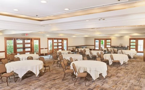 a room with tables and chairs