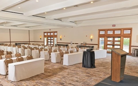 a room with tables and chairs