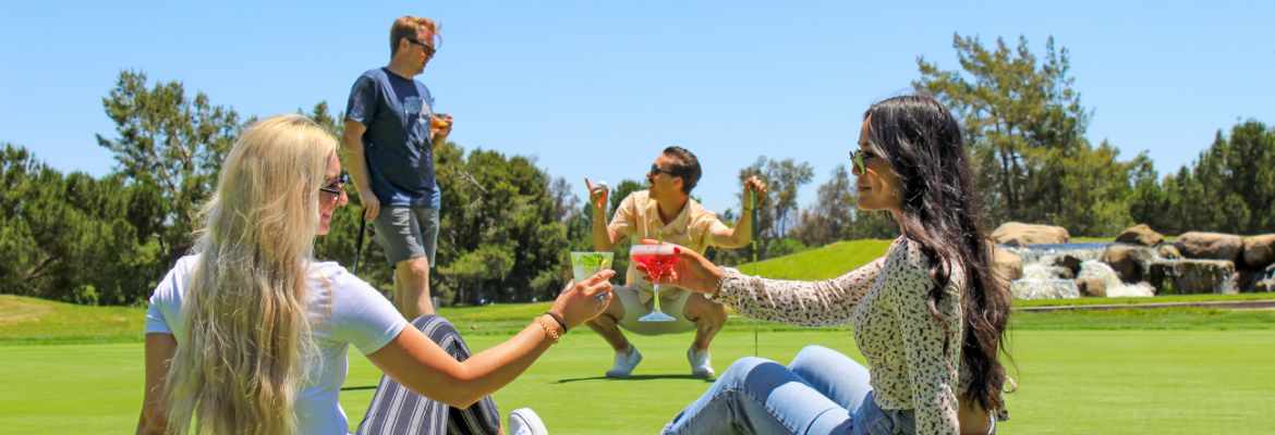 a group of people on a golf course