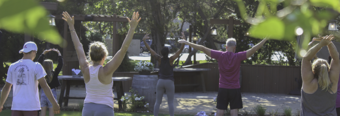 a group of people with their hands up
