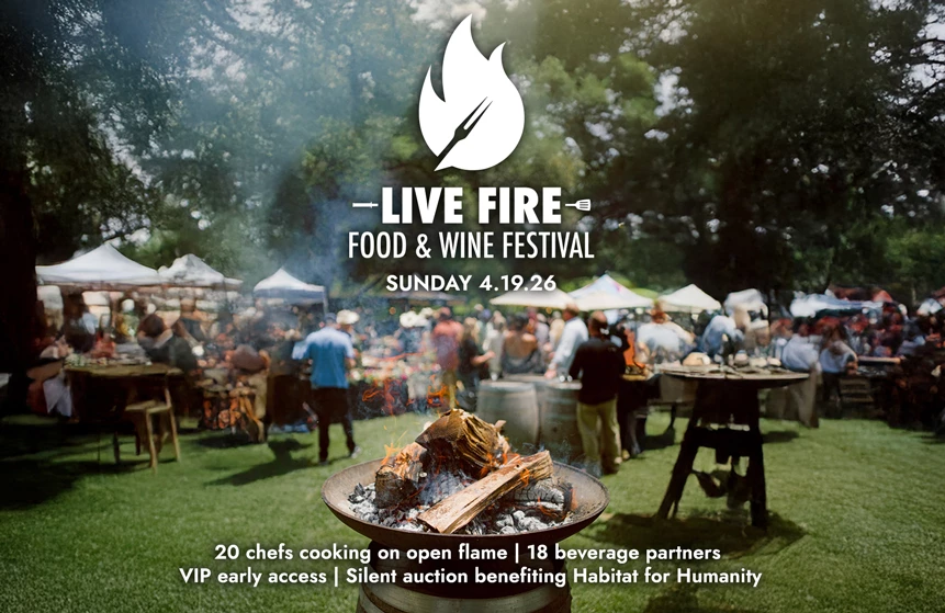 a group of people outside with a fire pit