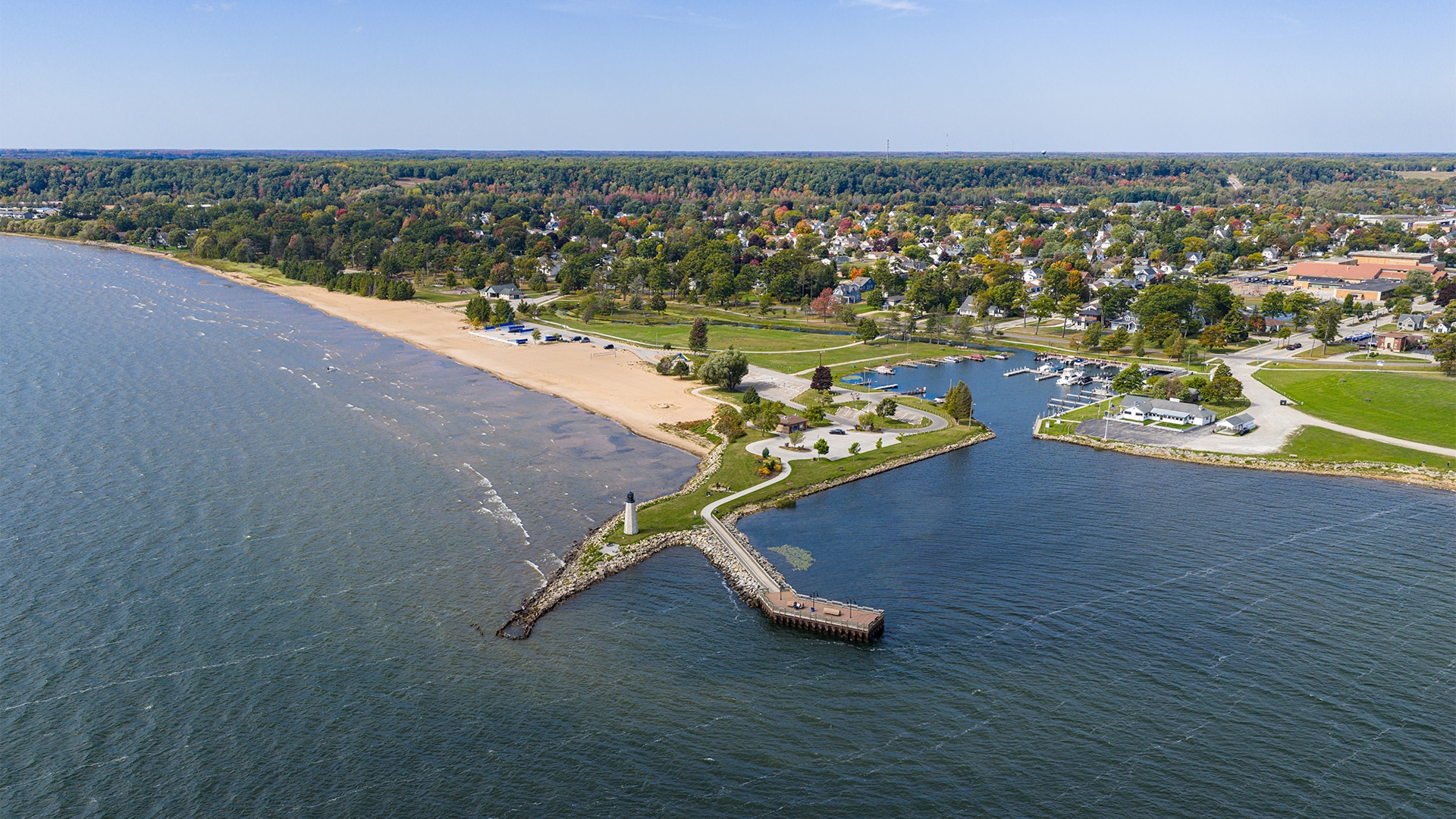 an aerial view of a beach and a city
