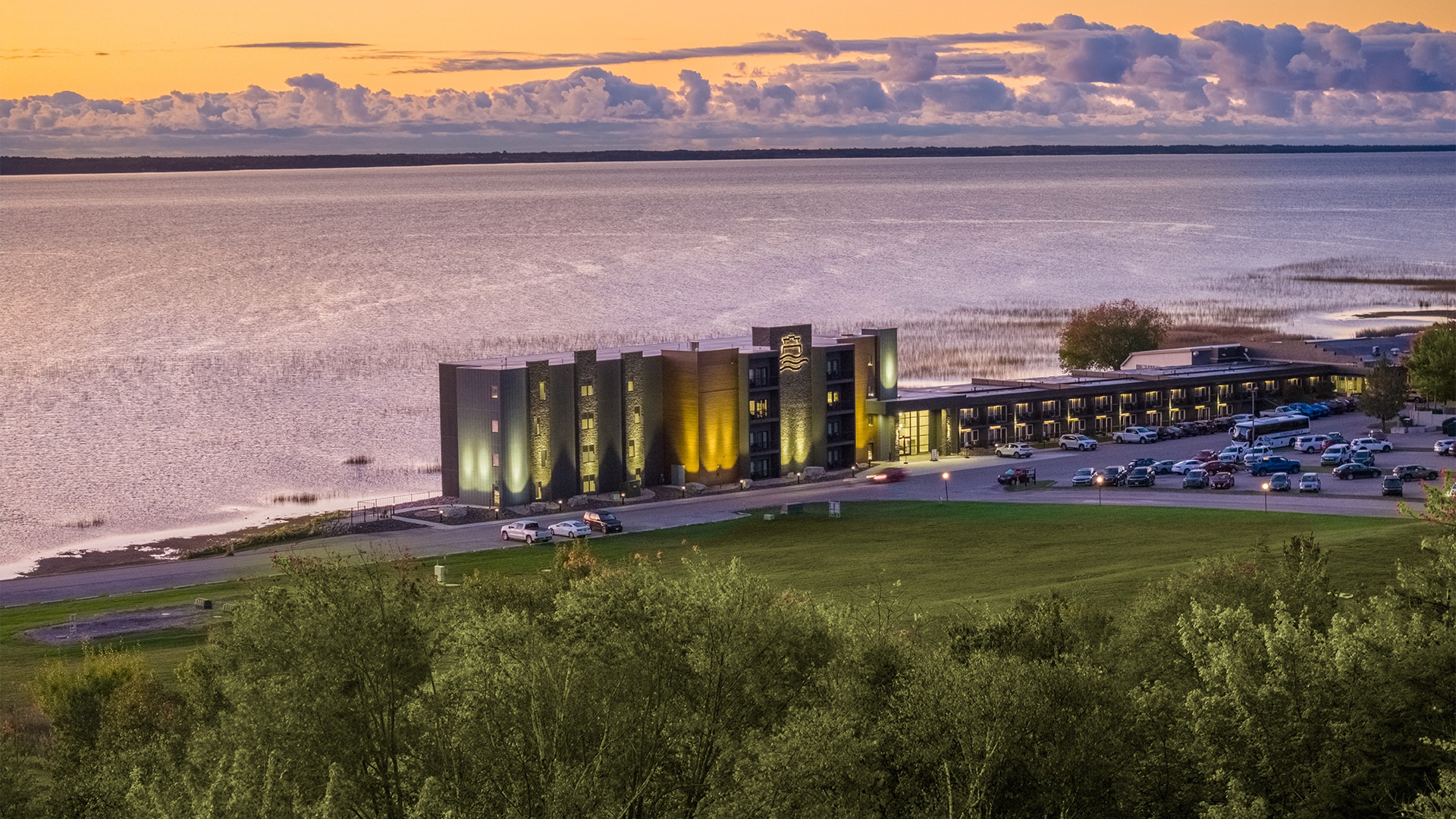 a building next to a body of water