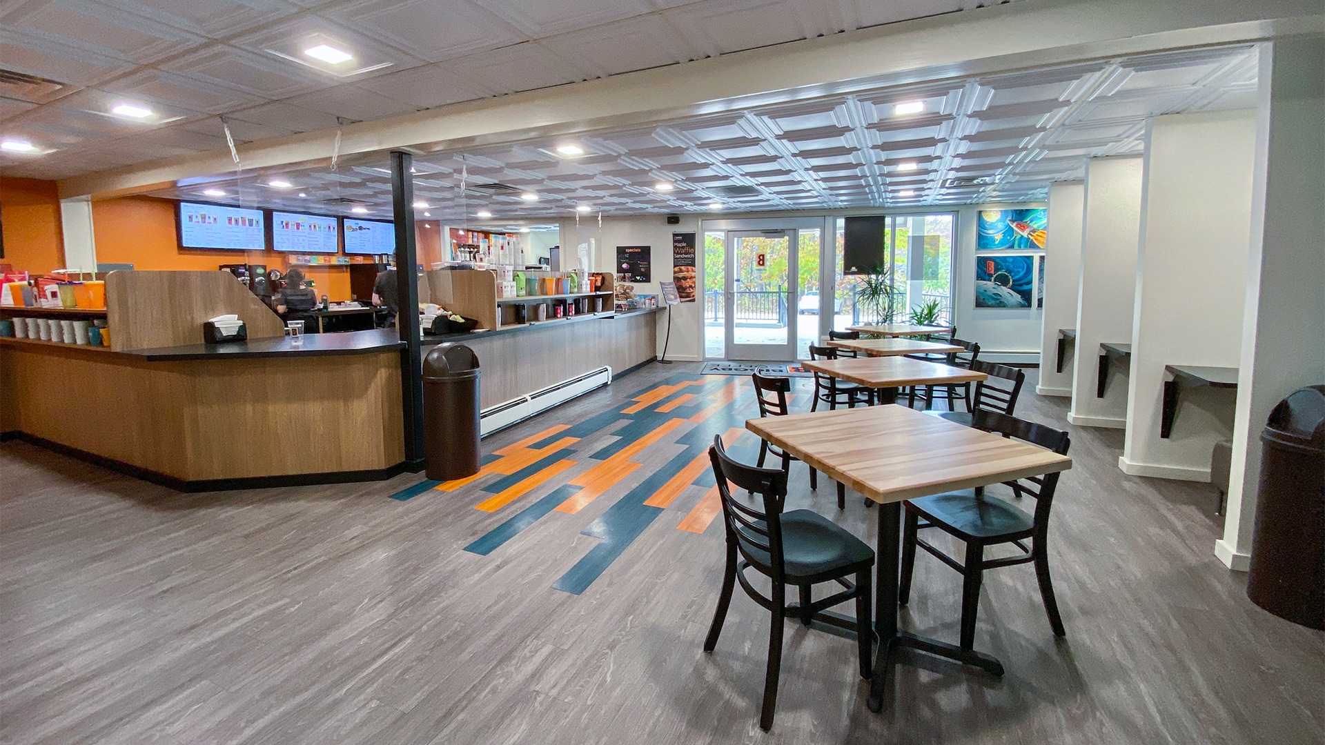 modern café interior with counter and seating area