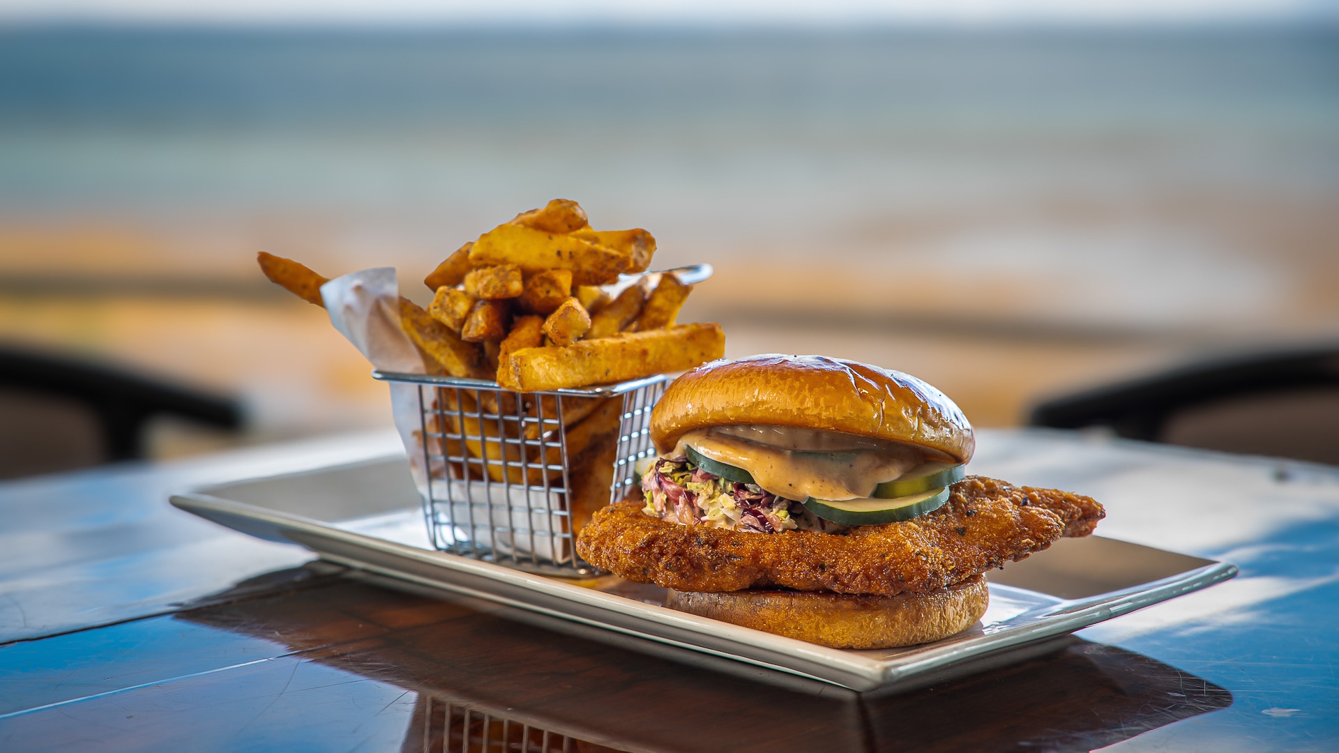 a burger and fries on a plate