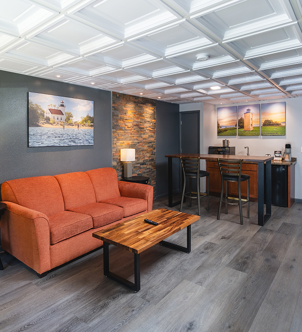 a living room with a couch and a table