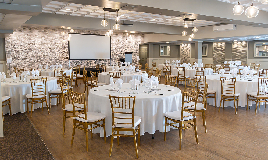 a room with tables and chairs
