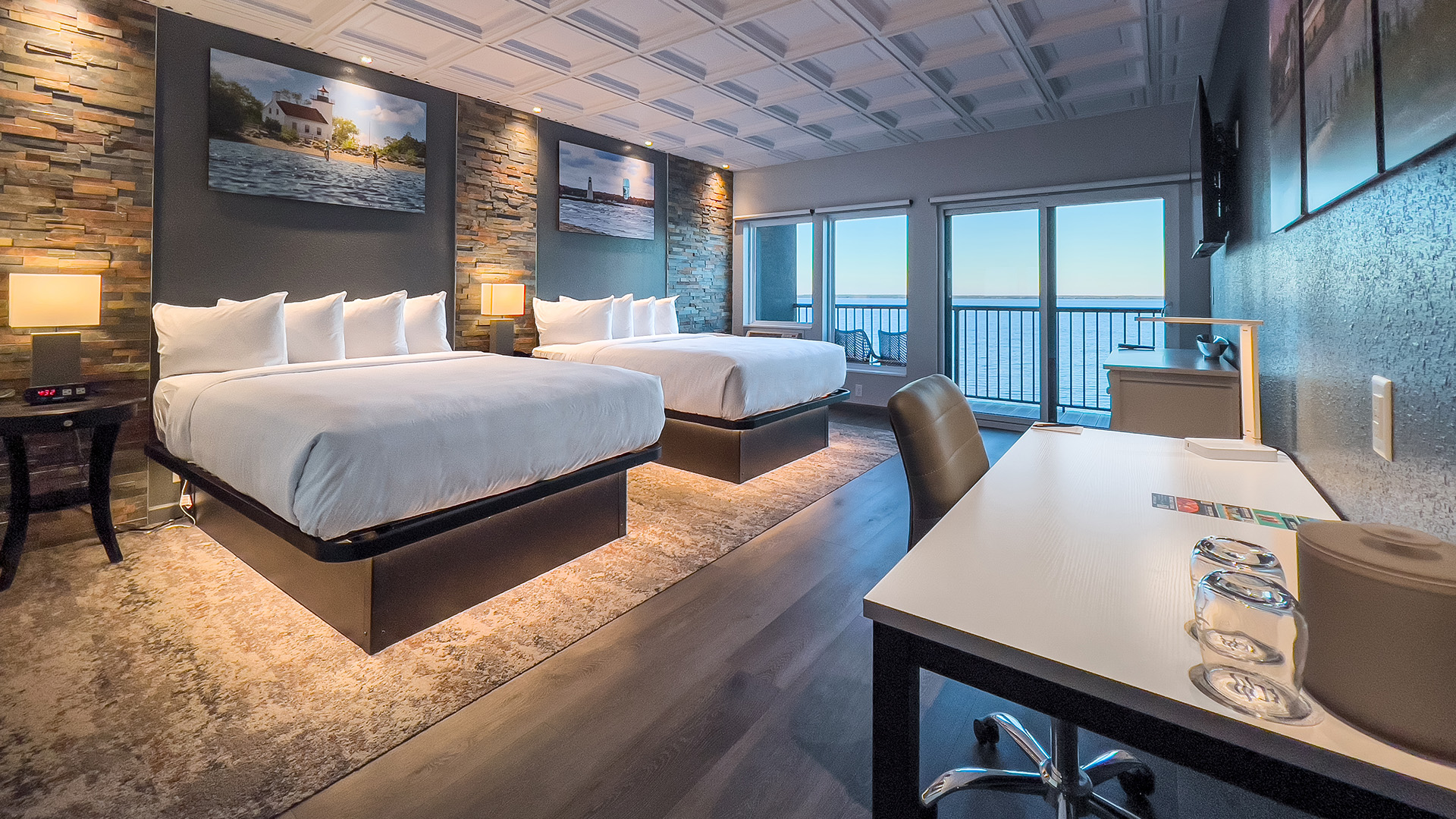 a room with two beds and a table