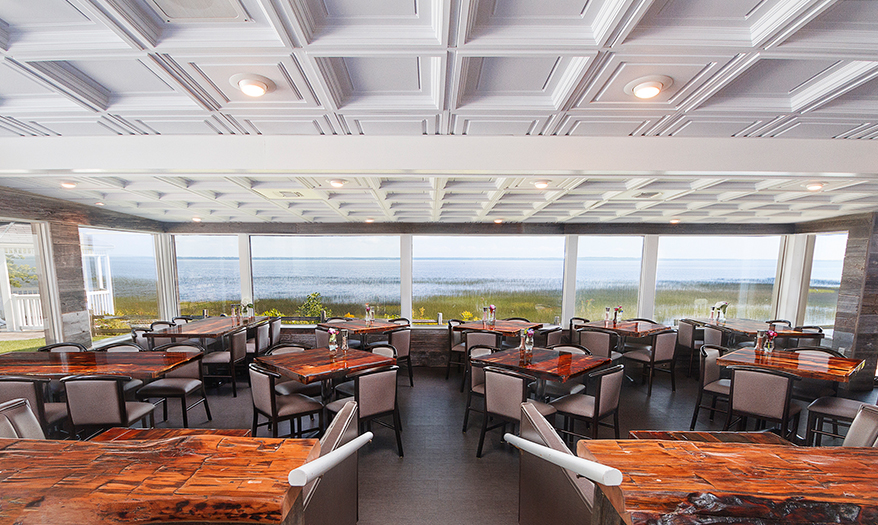 a room with tables and chairs