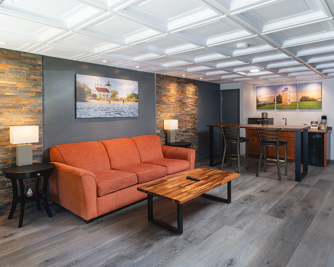 a living room with a couch and table