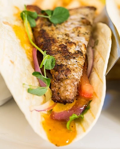 close up of a fish taco