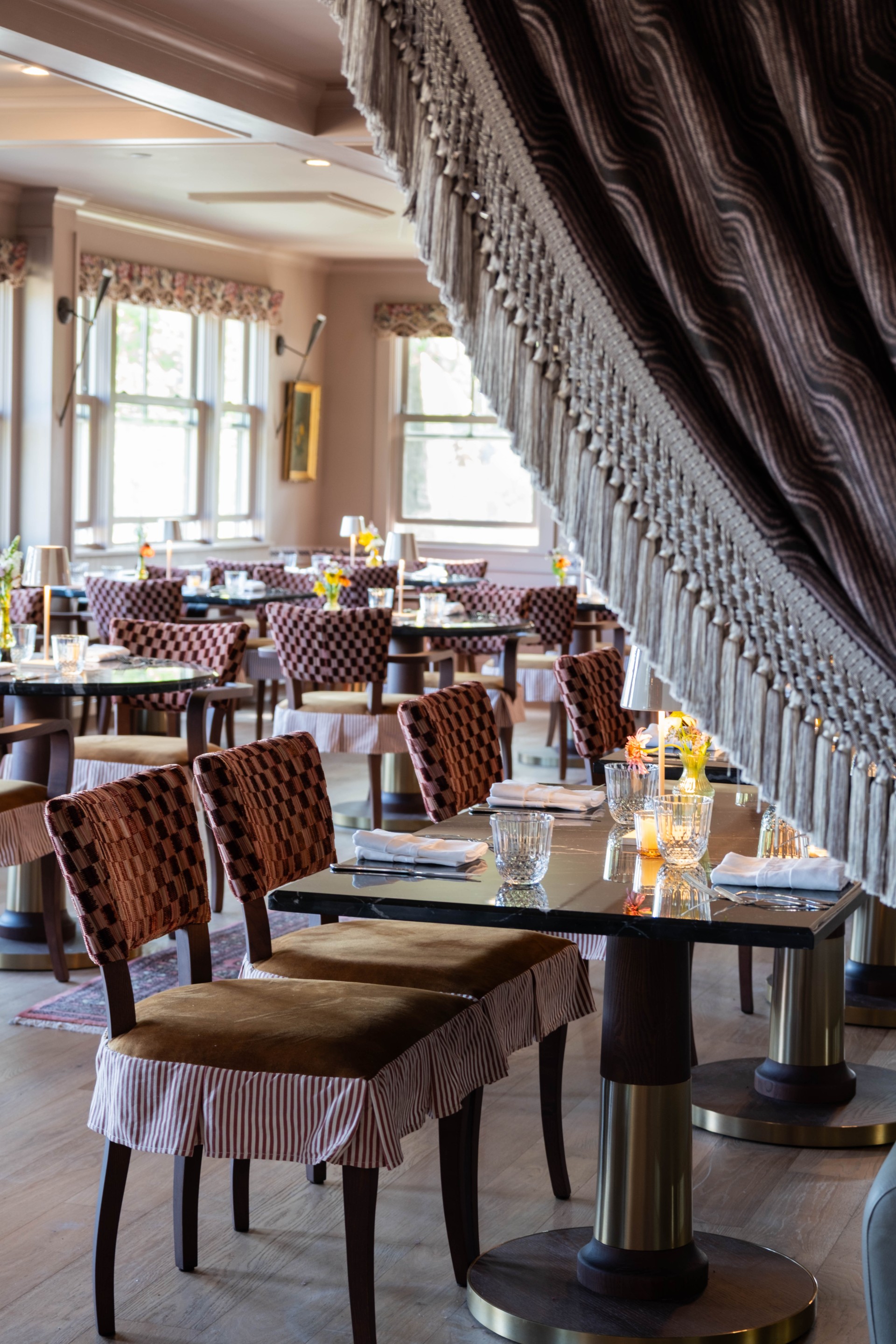 a restaurant with tables and chairs