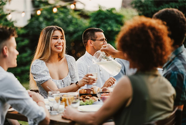 a group of people sitting at a table