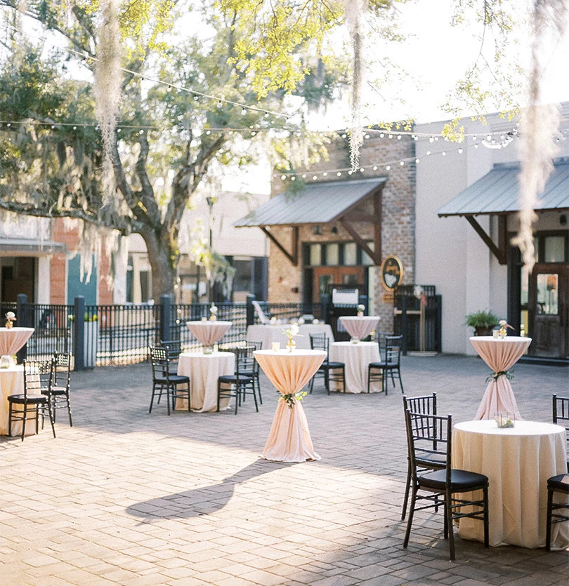 tables and chairs outside with tables and chairs