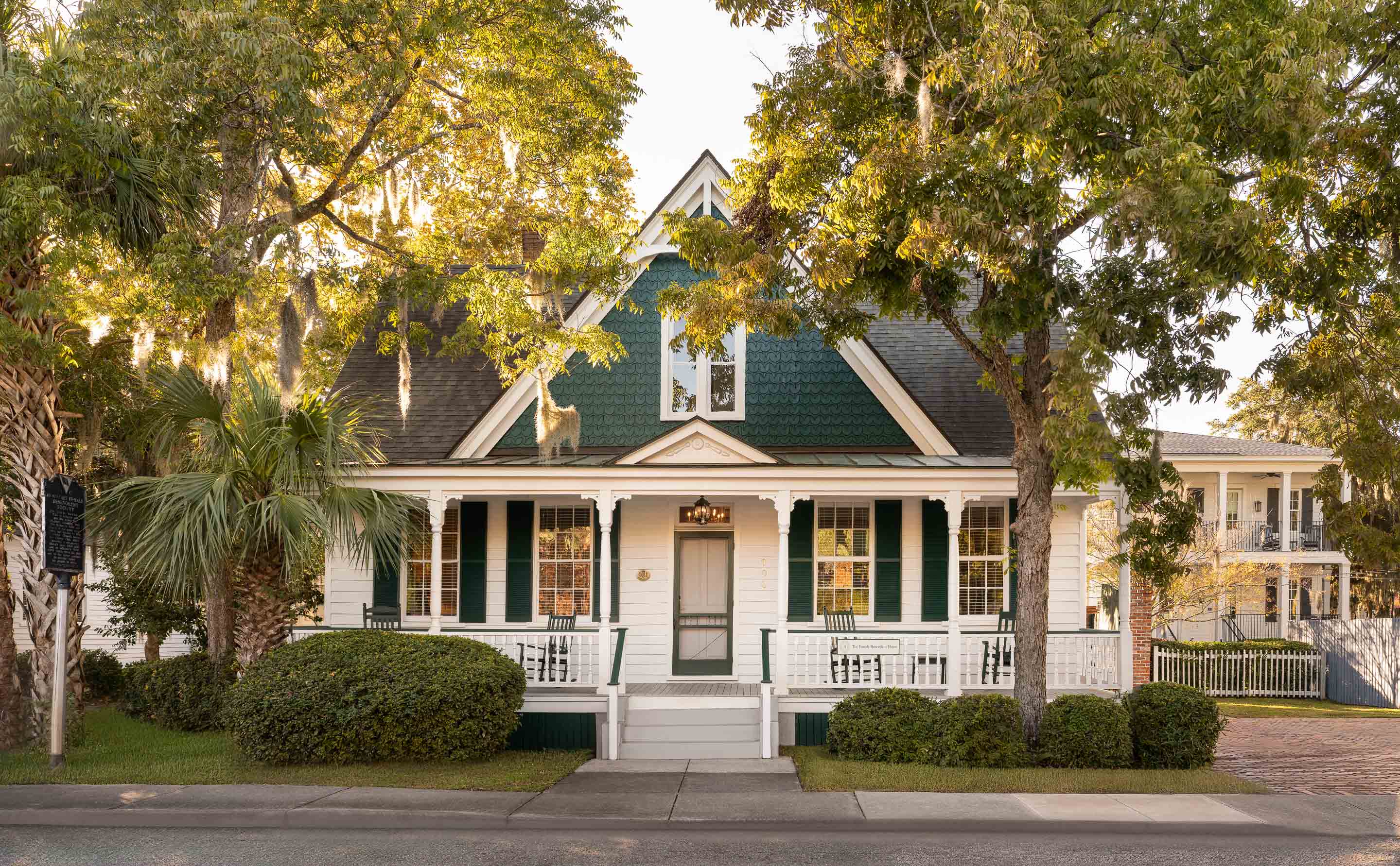 a house with trees and bushes