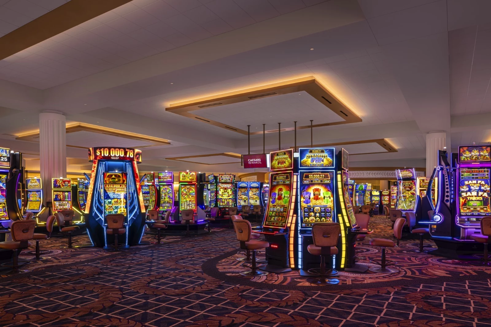 a room with colorful slot machines