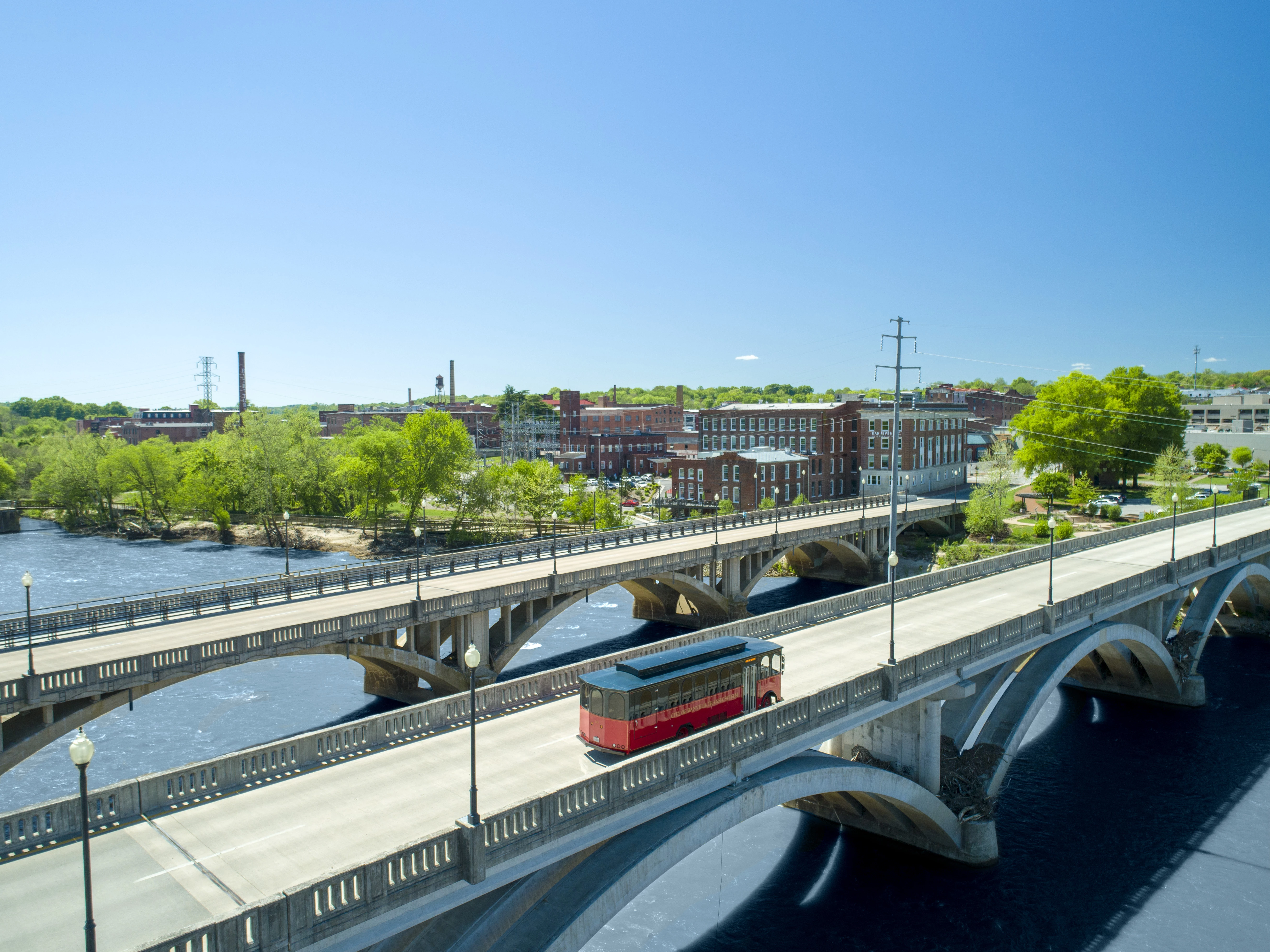 a bus on a bridge over water