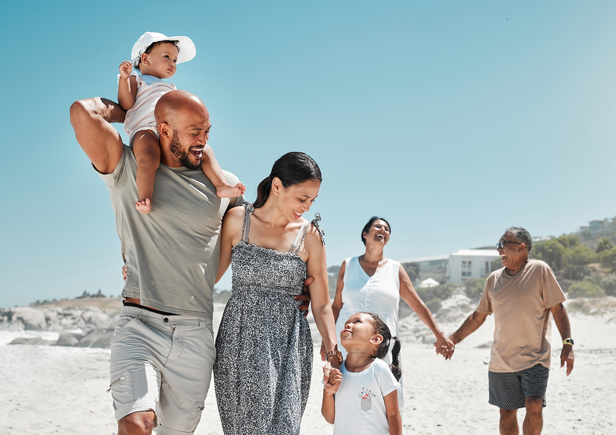 a family walking on the beach