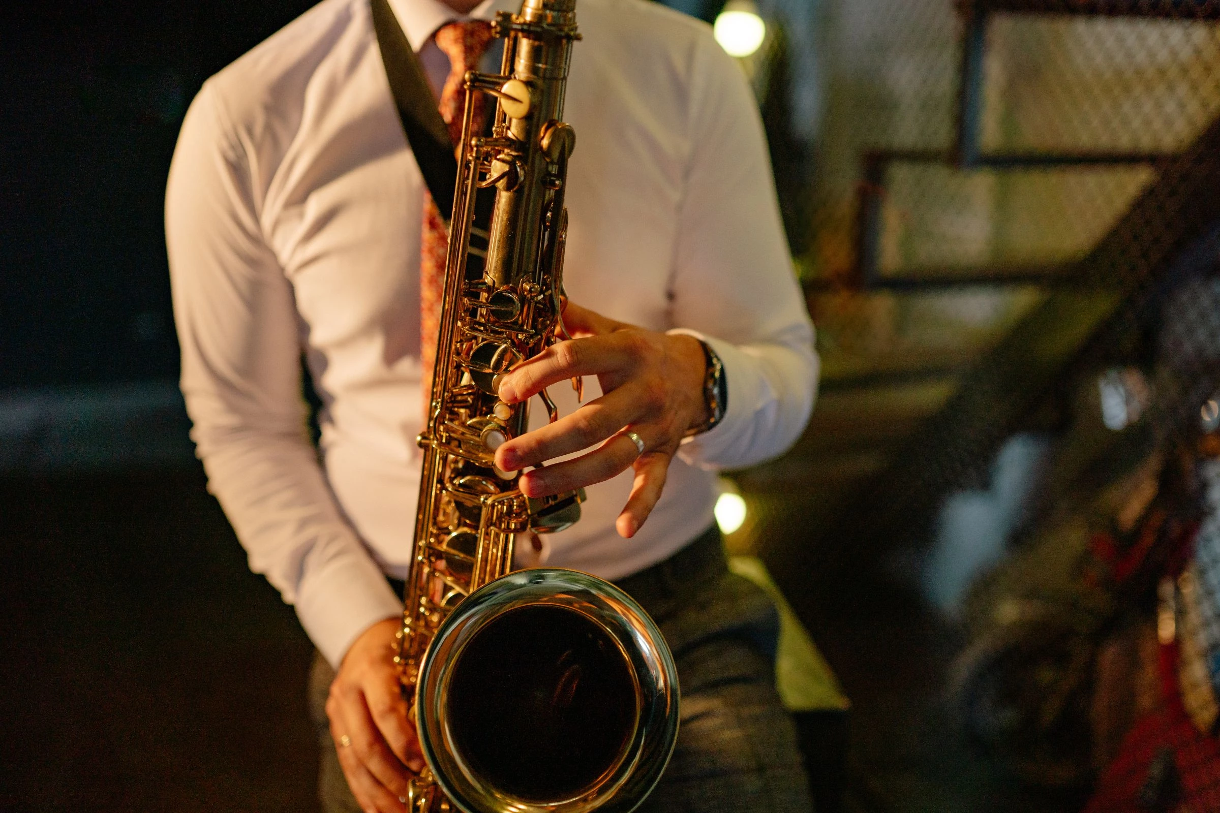 a man playing a saxophone