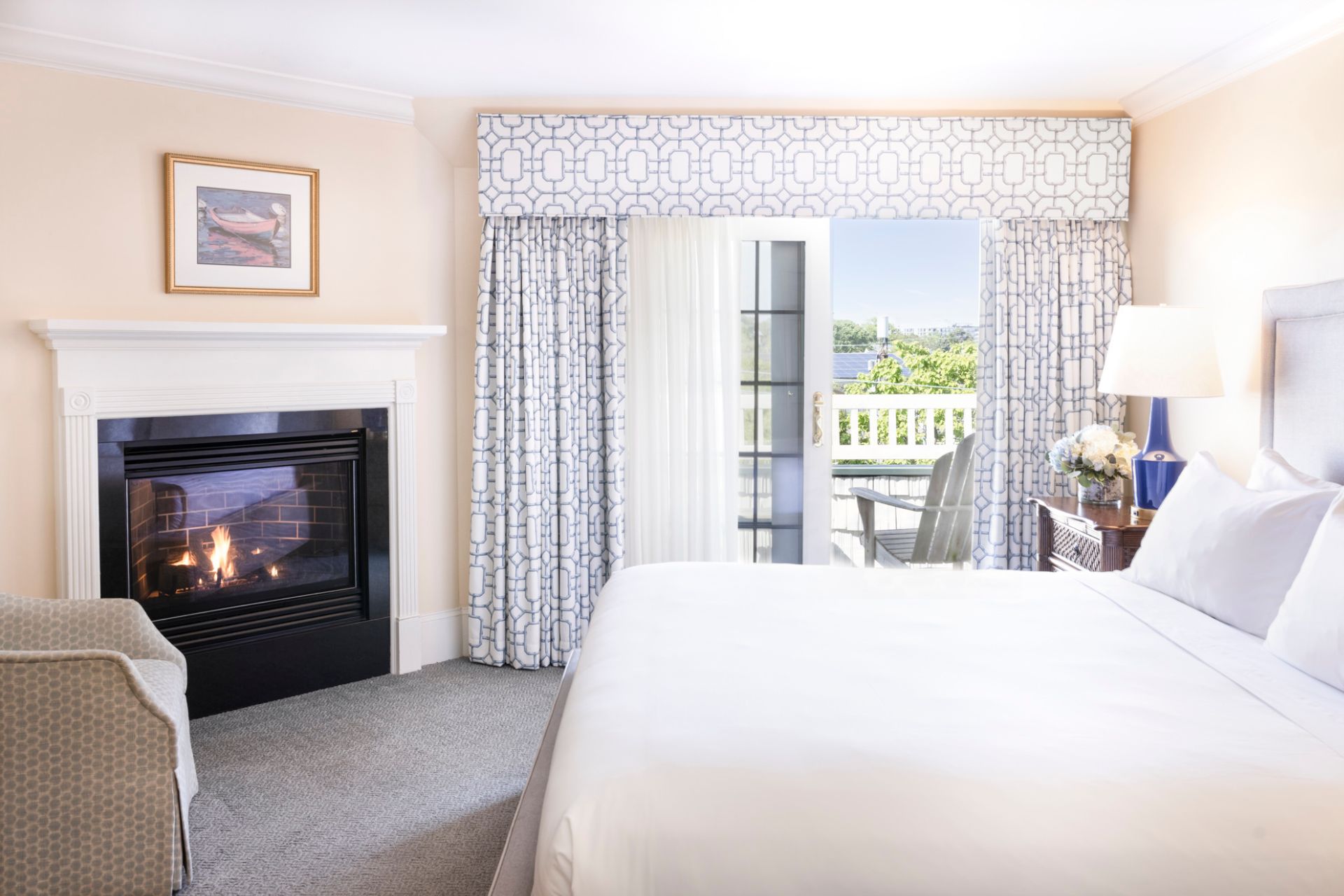 a room with a fireplace and a bed