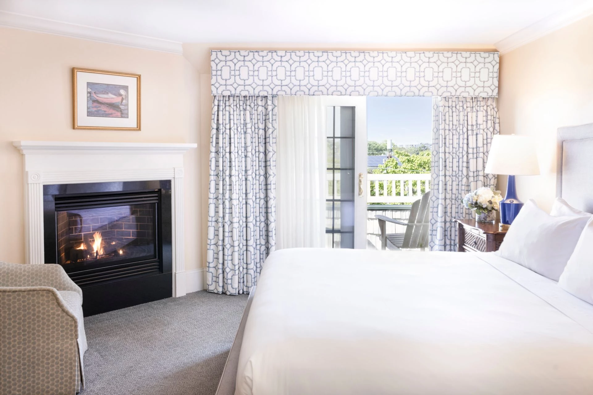 a room with a fireplace and a bed